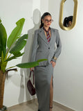 Tailleur gessato con gonna